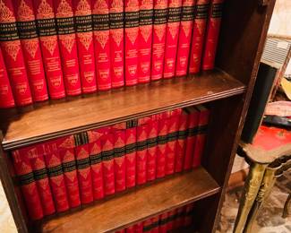 a complete collection of Harvard classics with the little book shelf that came with it