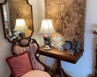 View of entry with Victorian chair and mahogany game table