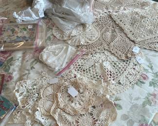 Wonderful porcelain doll and crocheted doilies