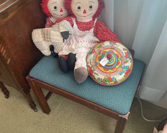 Vanity bench with vintage Raggedy Ann & Andy and vintage 3 Little Pigs Disney Ohio Art toy top