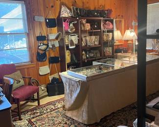 View of jewelry and designer purse room located in the back study