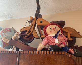 Rocking motorcycle with Knickerbocker Raggedy Andy