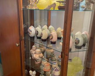 Curio of Hummels and Precious Moments
