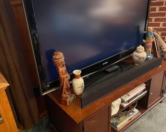 Sharp 50” flatscreen TV on stand