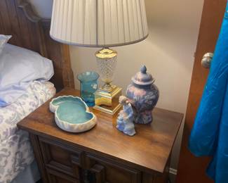 One of a pair of Broyhill nightstands with one of a pair of crystal and brass lamps