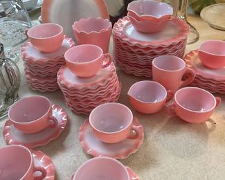 Large luncheon set of pink Ripple depression glass