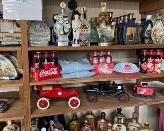 More liquor decanters and Coca Vola items
