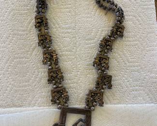 1950’s cast sterling Navajo Yei rain god. Signed FJ.
$950