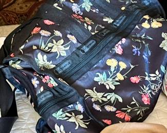 Loads of suitcases, purses and bags