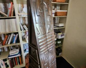 carved triangle chest