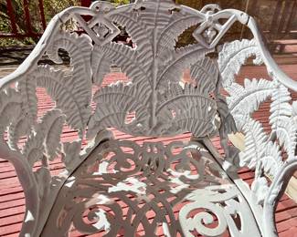 Pair of heavy iron chairs. JW Fiske, NY. Fern pattern.
$400 for chairs and table