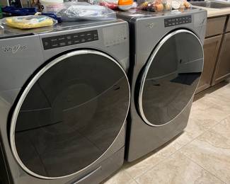 Whirlpool pool washer and dryer with pedal stools.  2 yrs new