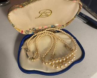 $150 - set of two strands pearls 