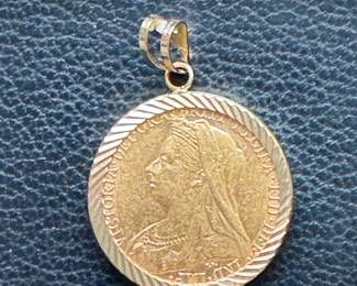 $500 -  1/2 Sovereign gold coin 0.917 Brit Victoria  - dated 1893 in 14kt bezel. 