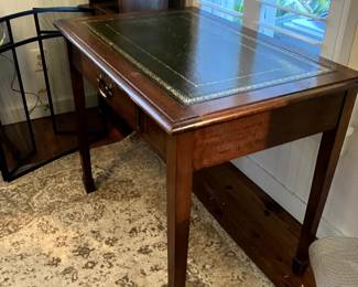 $450 - Desk with leather tooled top.