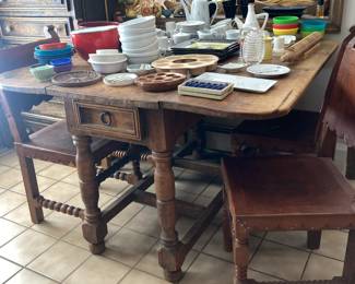 Rustic kitchen or game table with drop leaves, leather chairs (6), more dishes