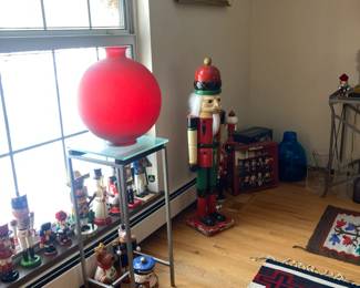Nutcrackers, Red Vase made in Spain on glass topped stand
