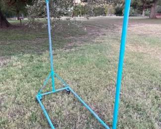 Gorgeous Turquoise Garment Rack.  The color is perfection. 