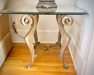 One of two glass/metal end tables