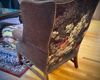 Armchair with solid front and floral back