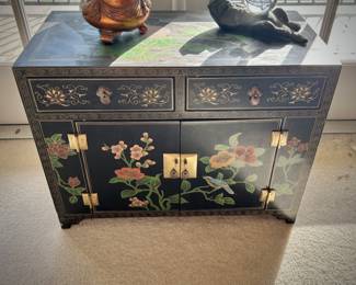 Black lacquer chinoiserie chest with brass fittings