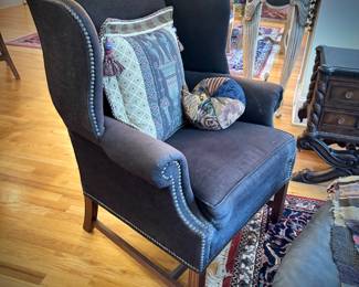 Armchair with solid front and floral back