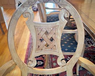 Table and 8 chairs. Table made in North Carolina. Six upholstered low chairs and two red upholstered grandfather chairs.