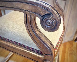 Four wood barstools with trim