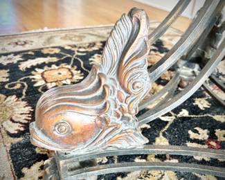 Round side table with fish detail on legs