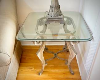 One of two glass/metal end tables