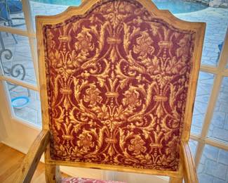 Table and 8 chairs. Table made in North Carolina. Six upholstered low chairs and two red upholstered grandfather chairs.