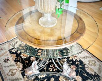 Round side table with fish detail on legs