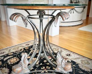 Round side table with fish detail on legs