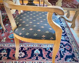 Table and 8 chairs. Table made in North Carolina. Six upholstered low chairs and two red upholstered grandfather chairs.