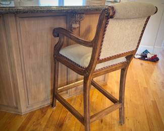 Four wood barstools with trim