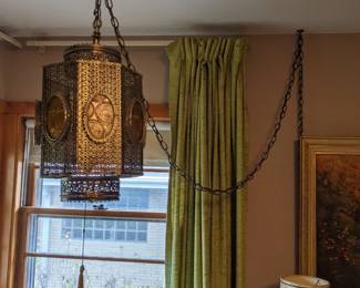 This stunning swag lamp turns on easily but has difficulty turning off.