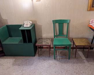 Old phone chair and old rotary phone.