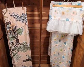 Inside wardrobe with vintage barkcloth fabric and adorable shear curtains with valance.