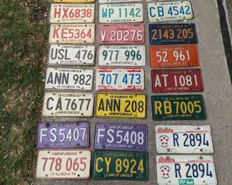 Vintage license plates will be in garage.