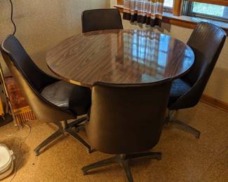 Not a scratch on it!  The chairs will need some help.