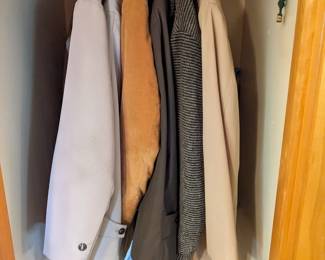 Vintage coats in hall closet.