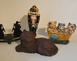 Antique cast iron door stops.