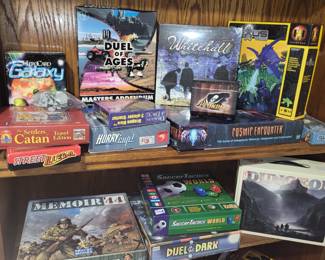 Tabletop RPGs including memoir 44 , dungeon , cosmic encounter , dragon dice , and settlers of catan.