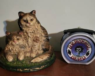 Antique doorstop and greatful dead lunchbox.