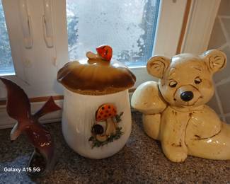 Mushroom bear and mushroom top cookie jars.