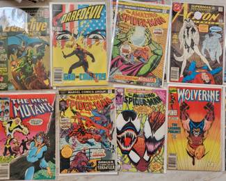 Collectible vintage comic books (some great amazing spiderman and action comics )