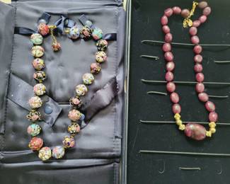 Murano glass and rubilite necklaces.