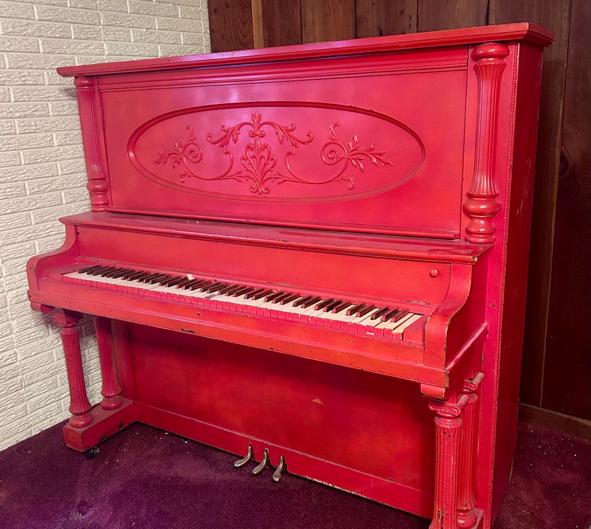 Vintage red piano