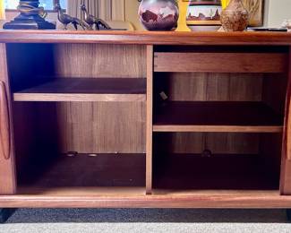 Mid century modern wood console table with sliding storage drawers and sliding door