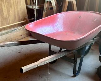 Vintage red wheel barrow